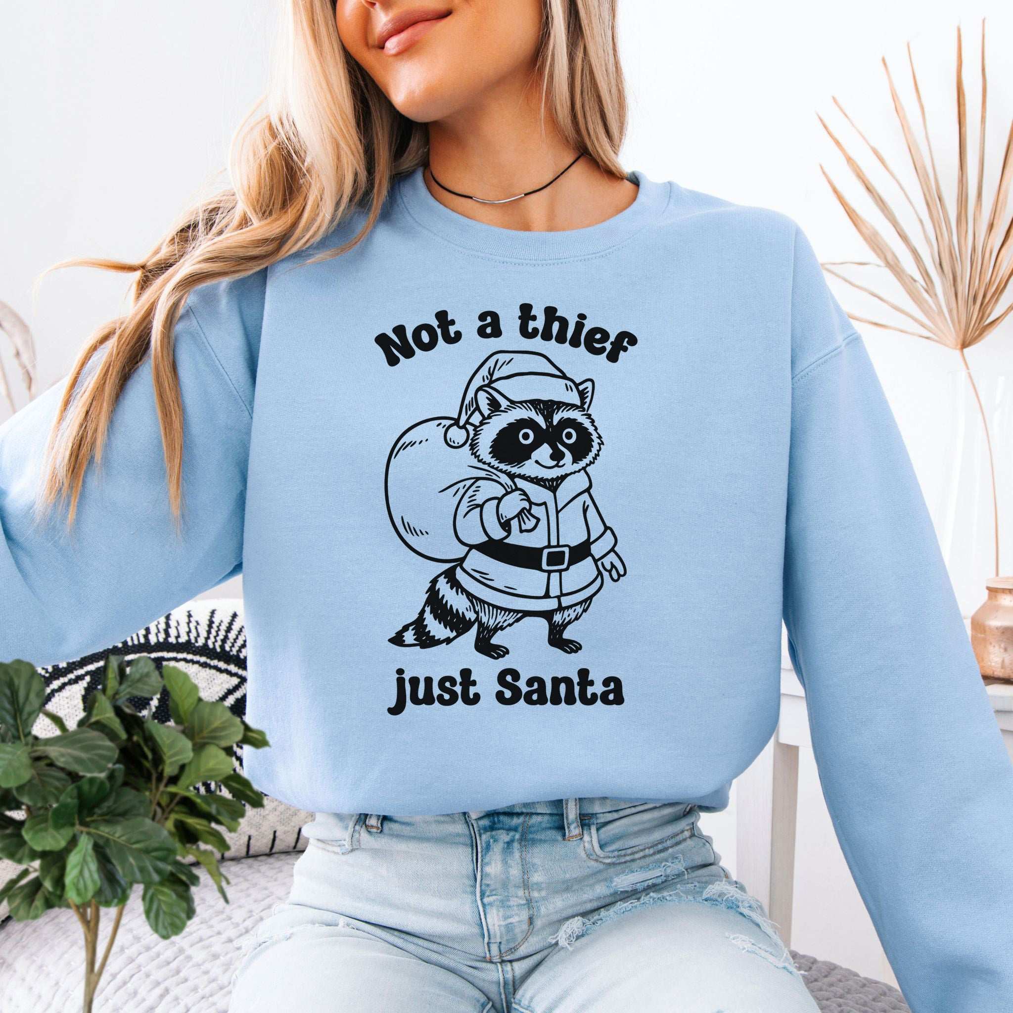 Shadow Santa Raccoon Sweatshirt – Funny Feral Christmas Mischief