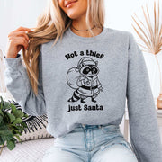 Shadow Santa Raccoon Sweatshirt – Funny Feral Christmas Mischief