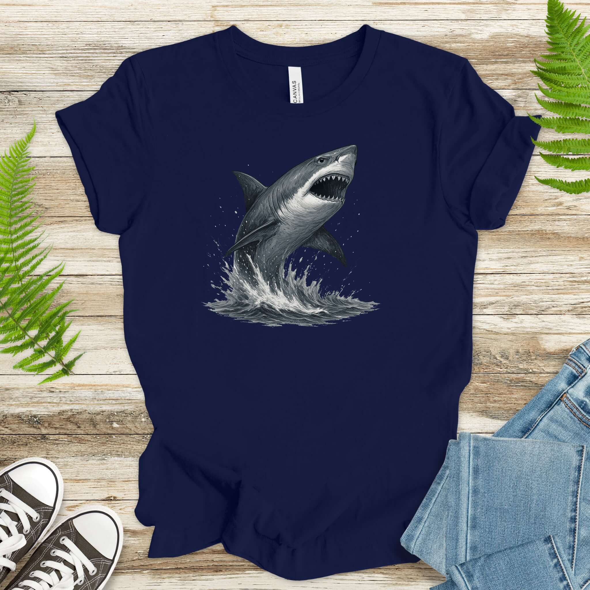 Great White Shark T-Shirt featuring a striking shark illustration breaching the ocean, perfect for shark lovers and ocean enthusiasts.