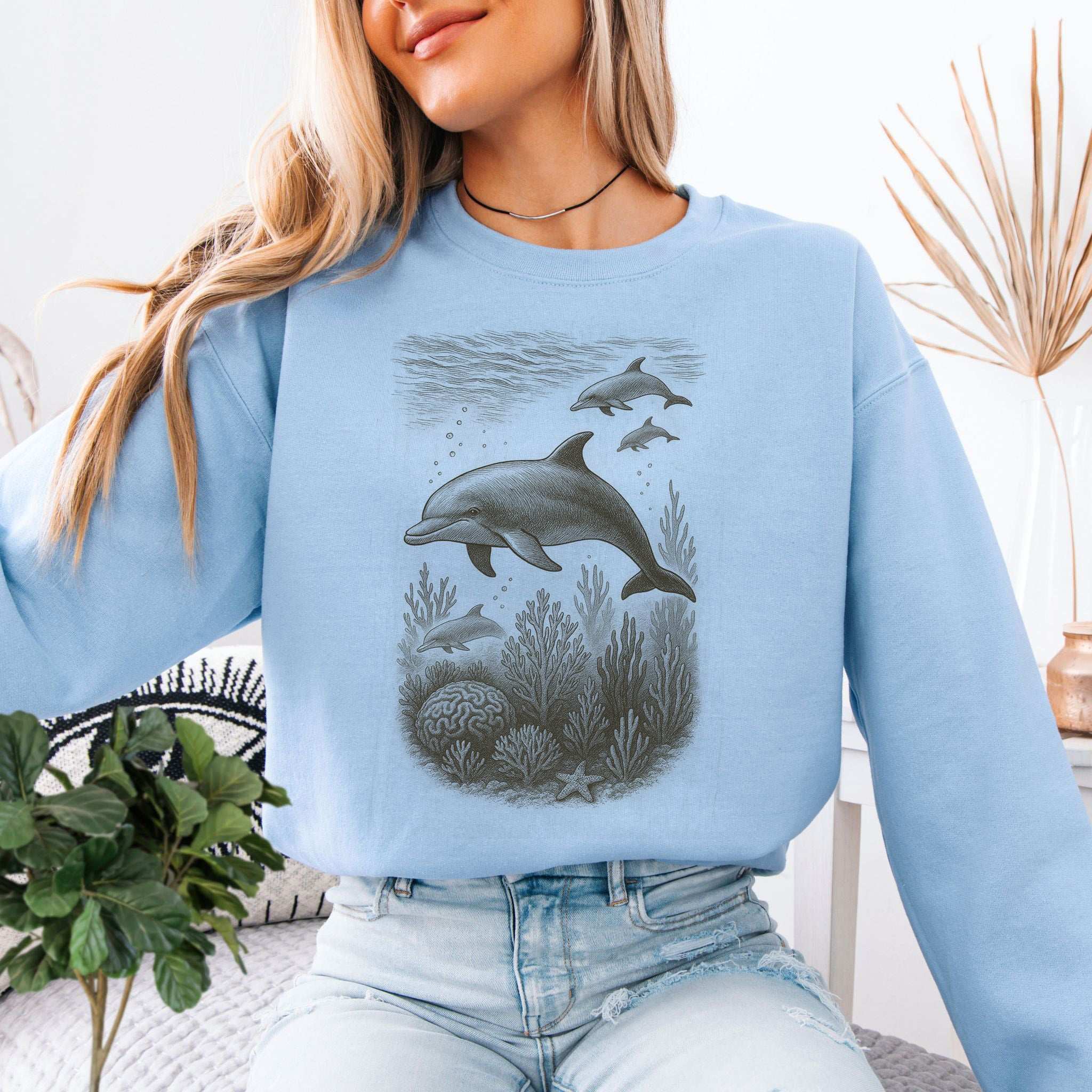 Dolphins and Coral Reef Sketch on Ocean Spirit Animal Sweatshirt, ideal for ocean lovers and cozy wear.