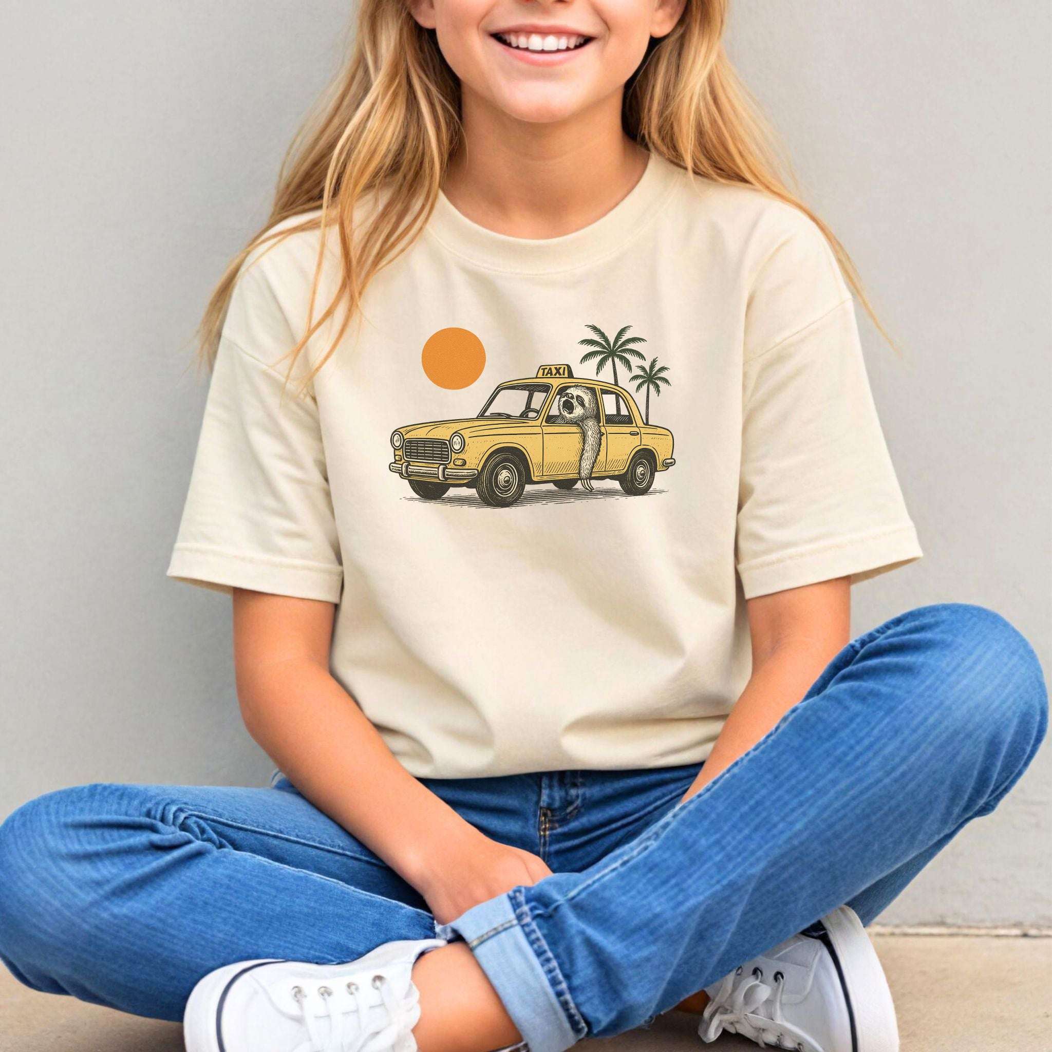 Sloth Taxi Driver – Tropical Sunset Cruiser Youth Tee