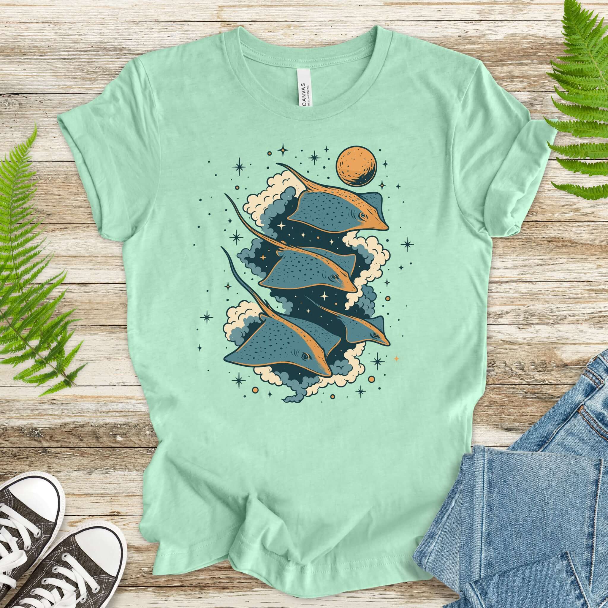 Fantasy t-shirt featuring flying trigons gliding through a cosmic scene, perfect for fantasy lovers.