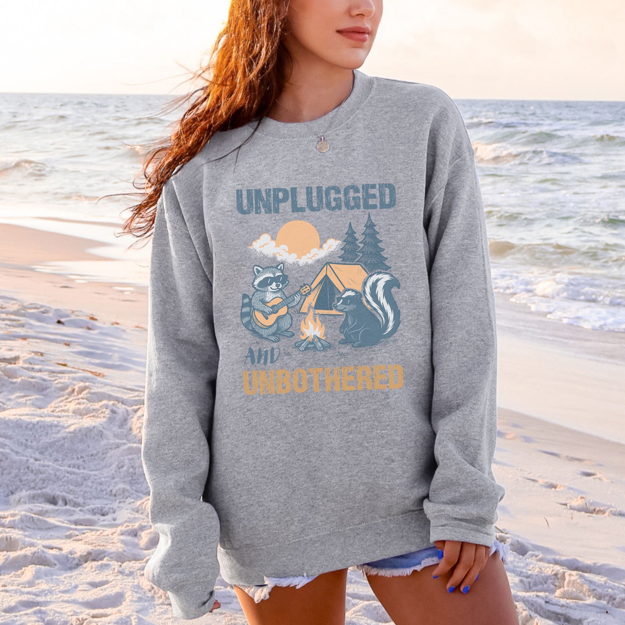 Unplugged and Unbothered Raccoon Camping Sweatshirt