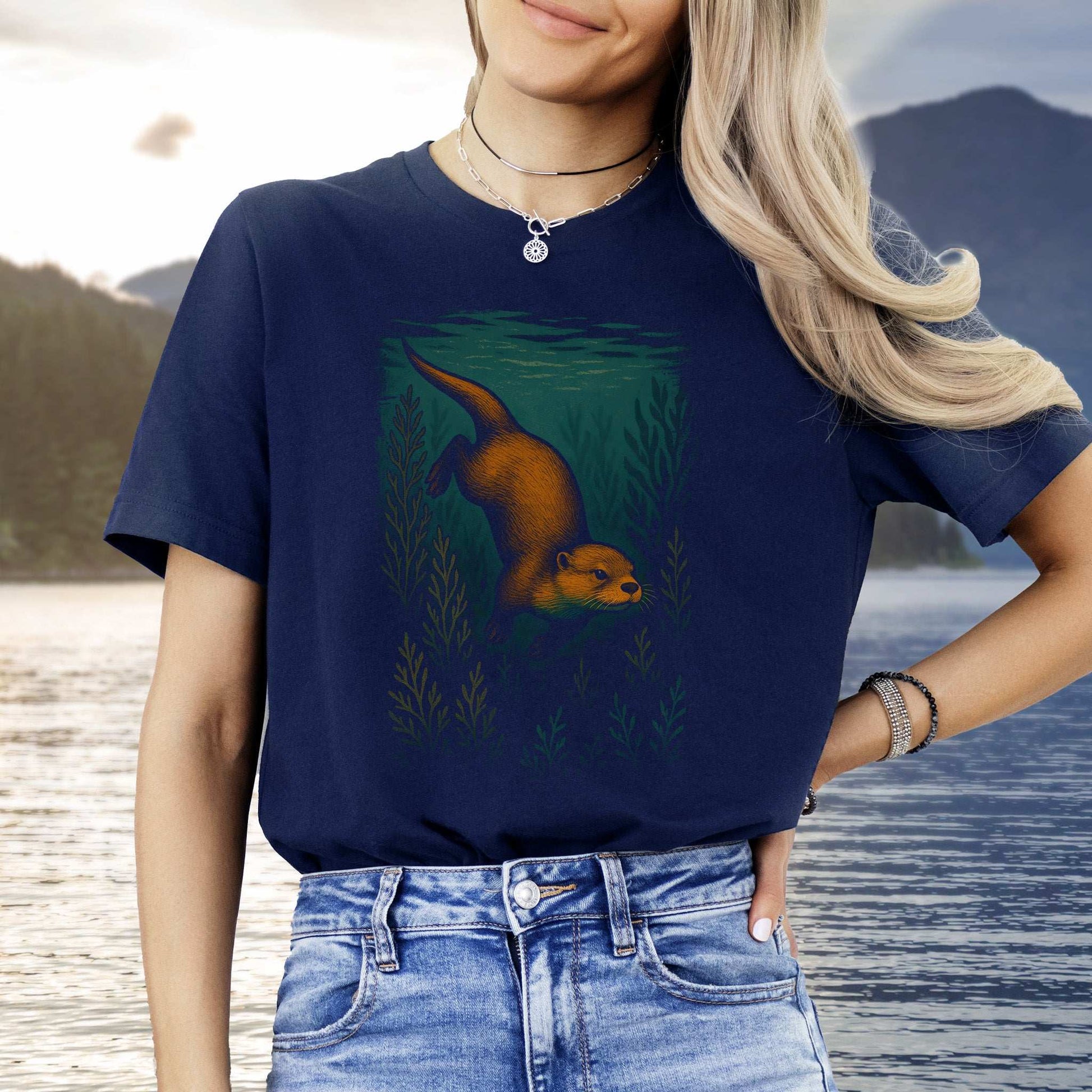 Otter Spirit Animal T-Shirt – Playful River Magic Vibes featuring a playful otter design on a navy background.