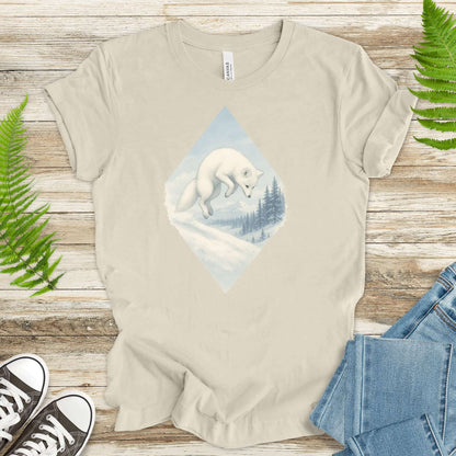 Jumping white fox in snow design on a light shirt, perfect for fantasy lovers and animal enthusiasts.
