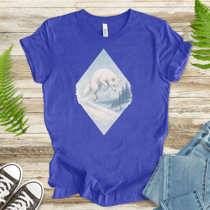 Jumping white fox graphic on a blue fantasy shirt, perfect for nature lovers and animal enthusiasts.