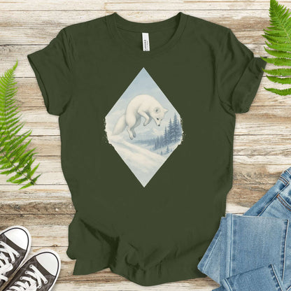 Jumping white fox printed on a green shirt, perfect for fantasy lovers and animal enthusiasts.