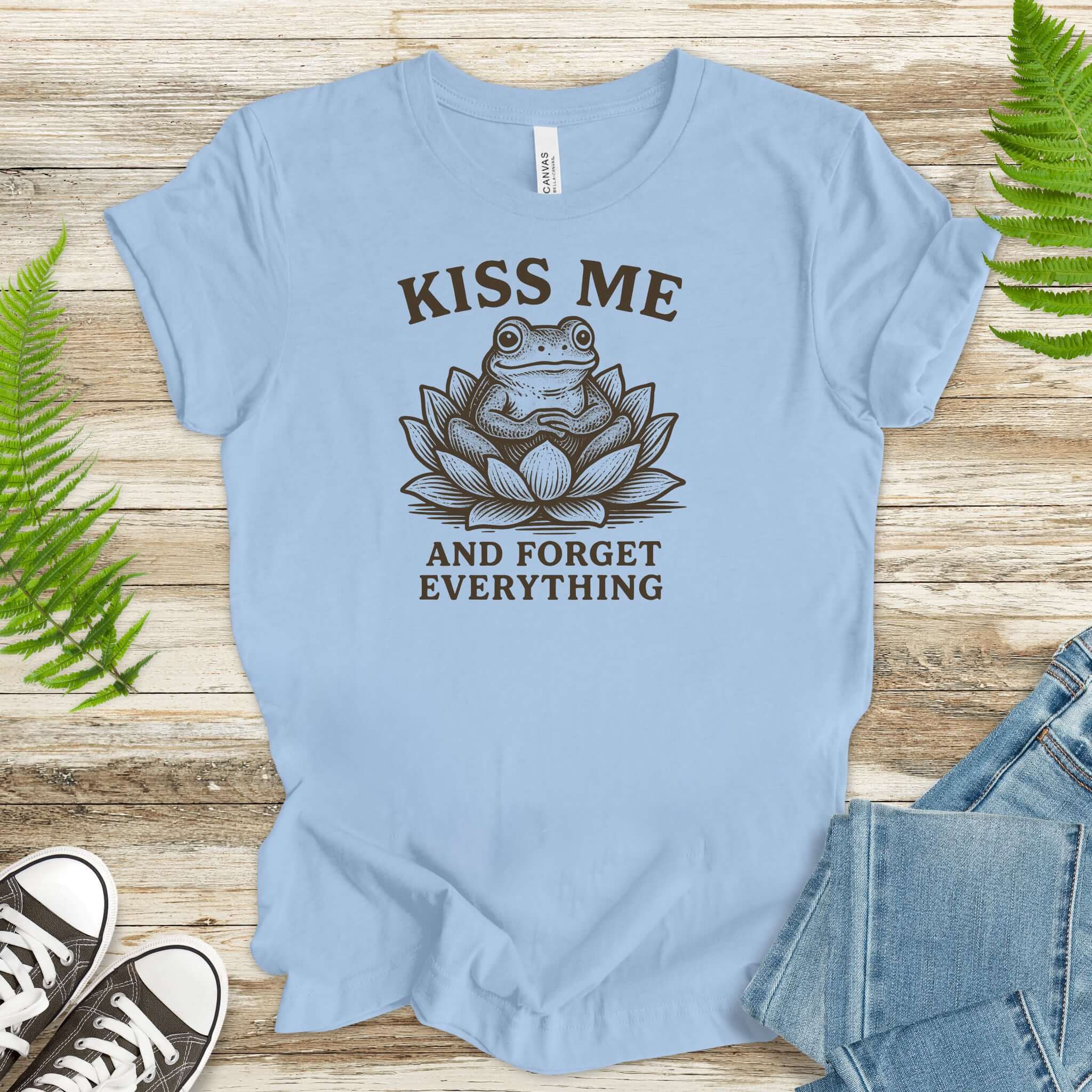 Kiss Me and Forget Everything Tee with funny frog in lotus flower design, perfect for sassy frog lovers.