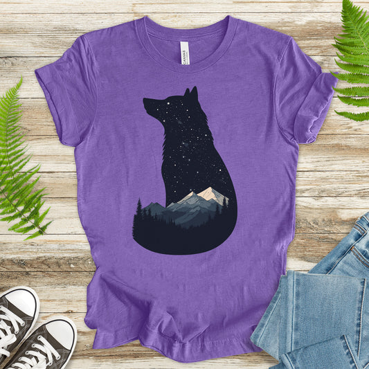 Wolf silhouette t-shirt with night mountain scene and moon, perfect for nature lovers and adventurers.